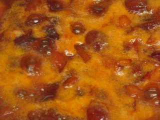 Making plum jam - boiling fruit Making plum jam - boiling fruit